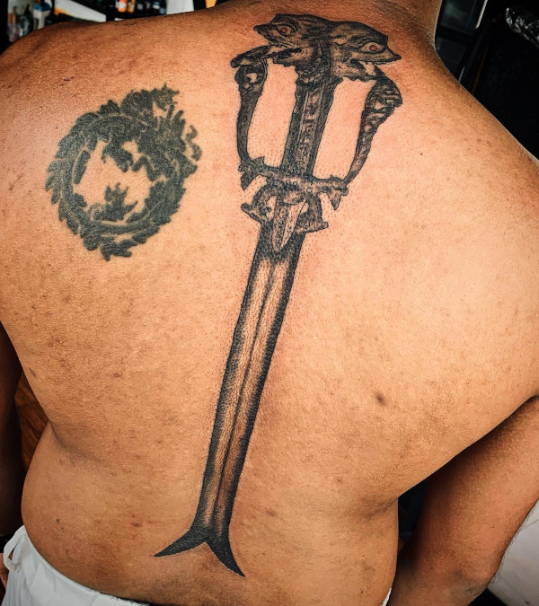 Guest - Feng Shui dragon tattoo