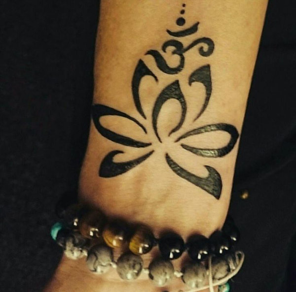 Guest - lotus aum tattoo