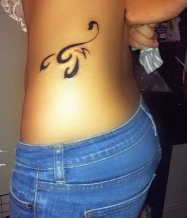 Guest - stylized scorpion tattoo