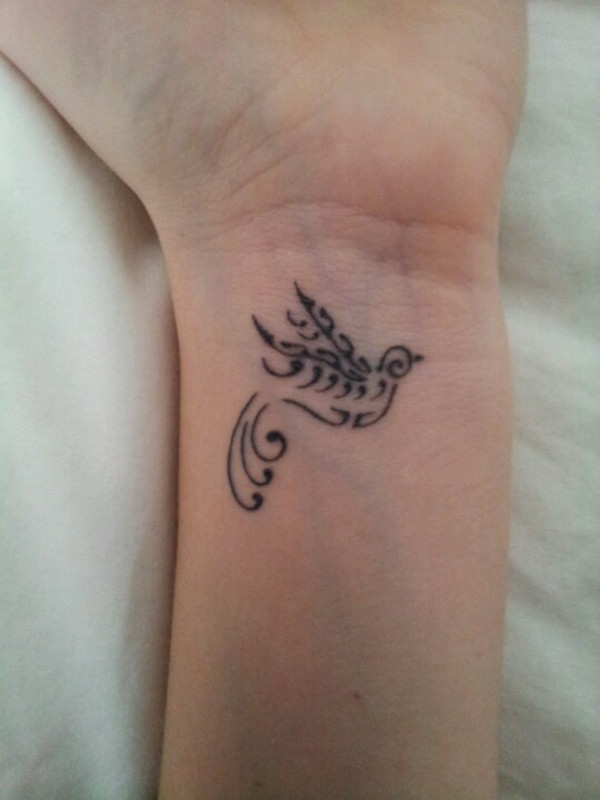 Guest - swallow tattoo