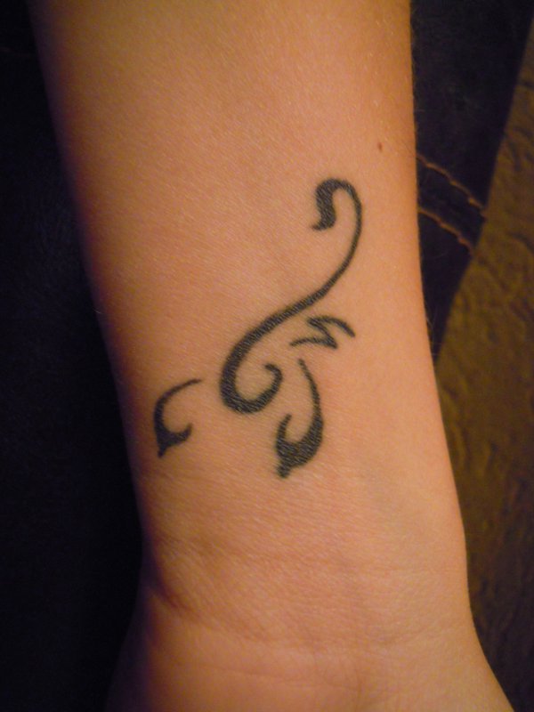 Renata - Stylized scorpion tattoo photo