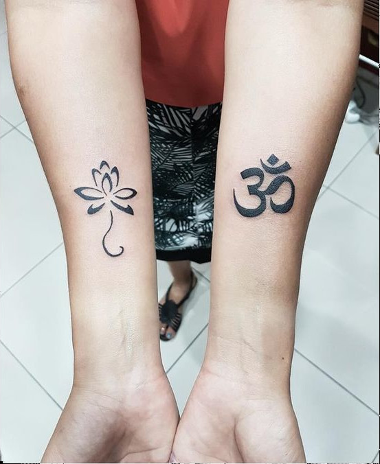 Guest - lotus & aum tattoo